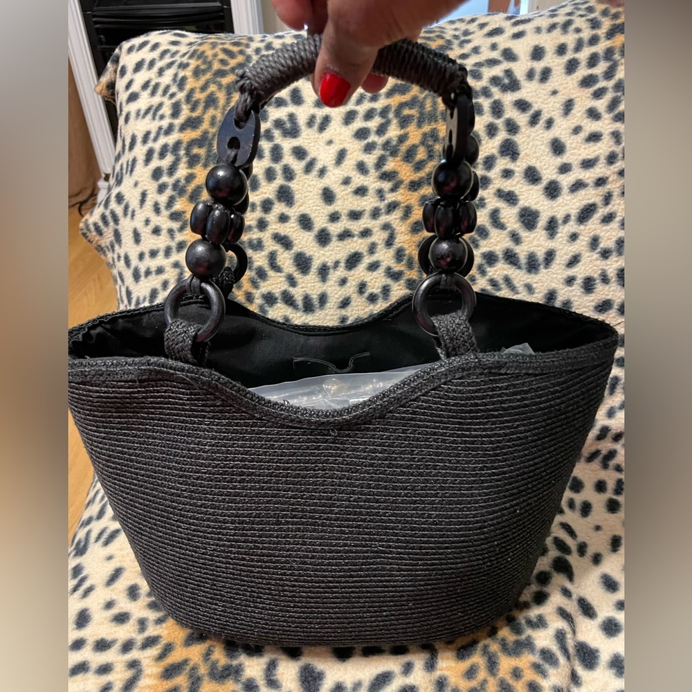 Black straw handbag